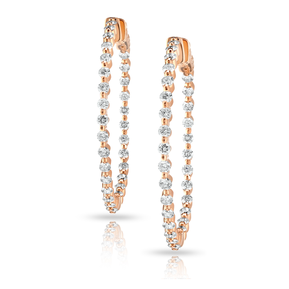 A pair of diamond hoop earrings with a rose gold finish, featuring round diamonds set in a shared prong setting.
