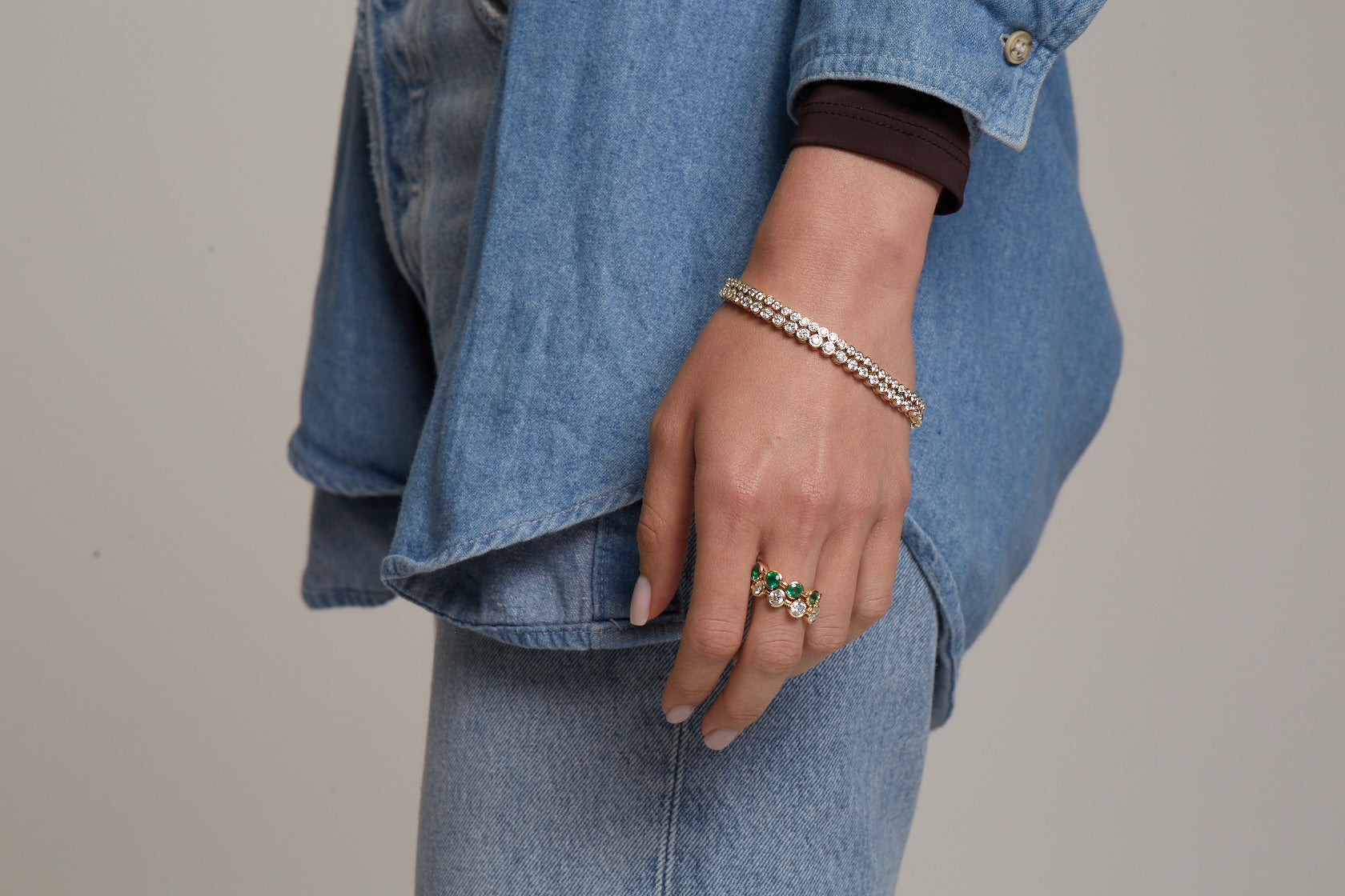 Semi Bezel Graduated Green Emerald Eternity Ring