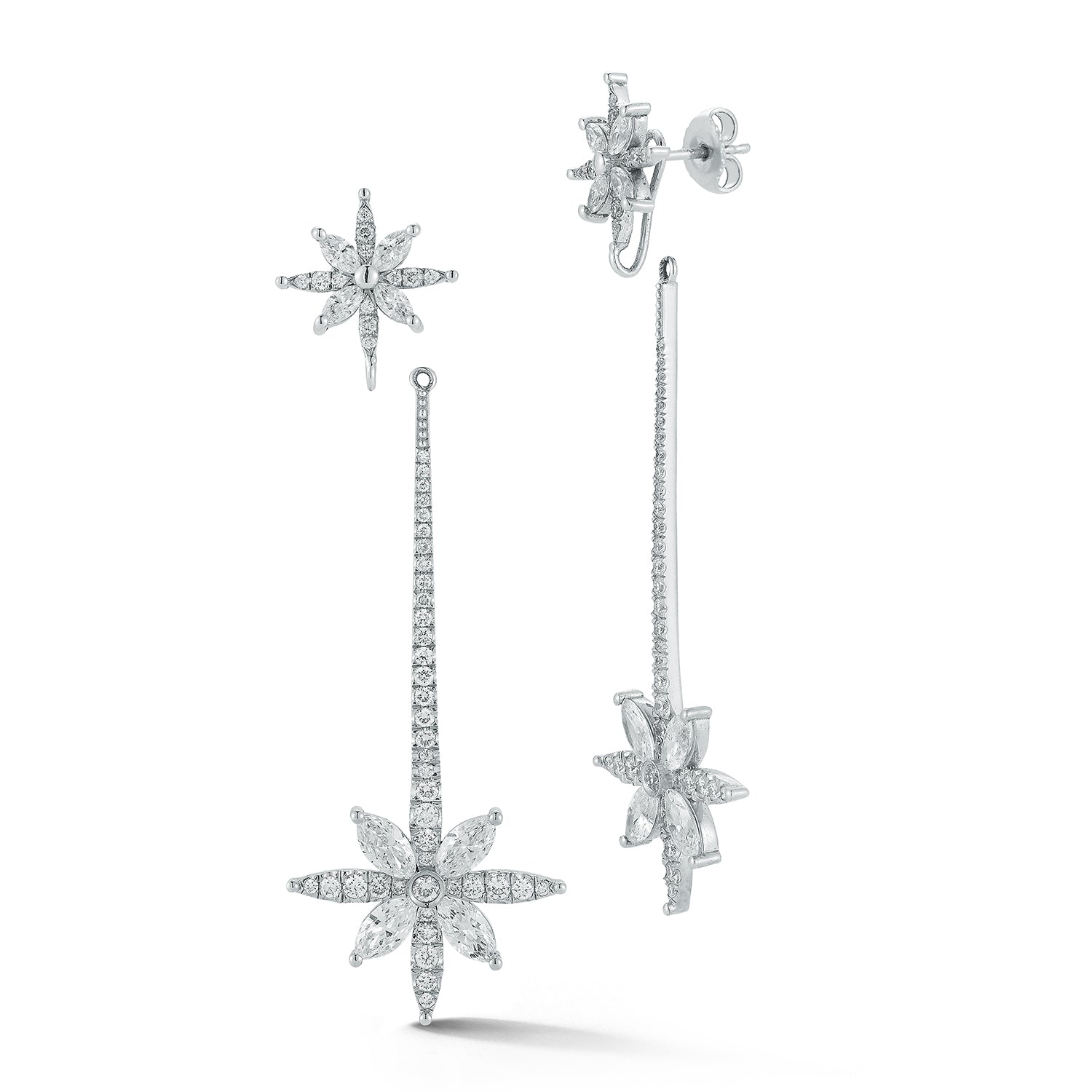 Star-shaped diamond earrings on a white background
